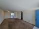 Spacious living room with carpet and light walls at 4895 Bay Ne St # 211, St Petersburg, FL 33703