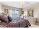 King-size bed, dresser, and waterfront views from this bedroom at 4900 Brittany S Dr # 1512, St Petersburg, FL 33715