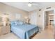 Bright bedroom with a queen bed and ensuite access at 4900 Brittany S Dr # 1512, St Petersburg, FL 33715