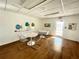Bright and airy common area with tables and chairs at 4900 Brittany S Dr # 1512, St Petersburg, FL 33715