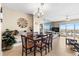 Elegant dining area with four chairs and water views at 4900 Brittany S Dr # 1512, St Petersburg, FL 33715