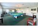 Community game room with pool tables and dartboard at 4900 Brittany S Dr # 1512, St Petersburg, FL 33715