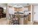 Modern kitchen with granite island and stainless steel appliances at 4900 Brittany S Dr # 1512, St Petersburg, FL 33715
