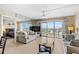 Bright living room, featuring water views and sofa at 4900 Brittany S Dr # 1512, St Petersburg, FL 33715
