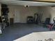Spacious two-car garage with an epoxy floor and water heater at 5153 Bay Isle Cir, Clearwater, FL 33760