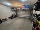 Organized garage with epoxy flooring, shelving, and ample storage space at 5153 Bay Isle Cir, Clearwater, FL 33760