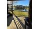 Relaxing screened porch overlooking a tranquil lake at 5153 Bay Isle Cir, Clearwater, FL 33760