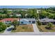 Aerial view of a house among other houses and trees at 6220 Westport Dr, Port Richey, FL 34668