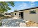 The home features a large backyard with a patio at 6220 Westport Dr, Port Richey, FL 34668