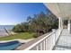 Relaxing balcony overlooking the pool, backyard and waterfront at 7172 Dr Martin Luther King Jr S St, St Petersburg, FL 33705