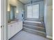 Elegant bathroom with soaking tub and updated vanity at 7172 Dr Martin Luther King Jr S St, St Petersburg, FL 33705