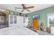 Large bedroom with ample closet space and a TV at 7172 Dr Martin Luther King Jr S St, St Petersburg, FL 33705