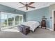 Bright bedroom with water views and sliding glass doors at 7172 Dr Martin Luther King Jr S St, St Petersburg, FL 33705