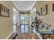 Bright entry hall with hardwood floors and access to backyard at 7172 Dr Martin Luther King Jr S St, St Petersburg, FL 33705