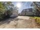 Two-story house with attached garage and large driveway at 7172 Dr Martin Luther King Jr S St, St Petersburg, FL 33705