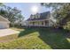 Two-story house with a wraparound porch and a brick walkway at 7172 Dr Martin Luther King Jr S St, St Petersburg, FL 33705