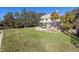 Two-story house with a pool and lush lawn at 7172 Dr Martin Luther King Jr S St, St Petersburg, FL 33705