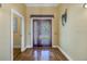 Inviting entryway with double doors and hardwood floors at 7172 Dr Martin Luther King Jr S St, St Petersburg, FL 33705