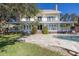 Two story house with large backyard, pool and patio at 7172 Dr Martin Luther King Jr S St, St Petersburg, FL 33705