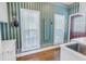 Laundry room with washer, dryer, and built-in cabinets at 7172 Dr Martin Luther King Jr S St, St Petersburg, FL 33705
