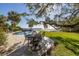 Peaceful patio with seating area near the pool at 7172 Dr Martin Luther King Jr S St, St Petersburg, FL 33705