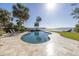 Inviting kidney-shaped pool with waterfront views at 7172 Dr Martin Luther King Jr S St, St Petersburg, FL 33705