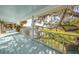 Peaceful porch overlooking the water and yard at 7172 Dr Martin Luther King Jr S St, St Petersburg, FL 33705