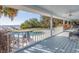 Relaxing waterfront porch with pool and patio access at 7172 Dr Martin Luther King Jr S St, St Petersburg, FL 33705
