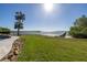 View of waterfront property with a dock at 7172 Dr Martin Luther King Jr S St, St Petersburg, FL 33705