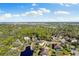 Home situated on a tranquil lot near a pond, offering privacy and serene views at 7876 Marsh Pointe Dr, Tampa, FL 33635