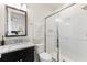 Clean bathroom with granite countertops and a walk-in shower at 7876 Marsh Pointe Dr, Tampa, FL 33635