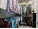 Large walk-in closet with ample hanging space and shelving at 7876 Marsh Pointe Dr, Tampa, FL 33635