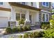 Stunning two-story home with stone accents and inviting front porch at 7876 Marsh Pointe Dr, Tampa, FL 33635
