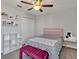 Bedroom with double bed, closet, and built-in shelves at 8506 Hunters Fork Loop, Ruskin, FL 33573
