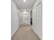 Bright foyer with neutral walls and carpet at 8506 Hunters Fork Loop, Ruskin, FL 33573