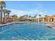 Steps leading into a refreshing community pool at 8506 Hunters Fork Loop, Ruskin, FL 33573