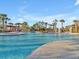 Resort-style pool with multiple seating areas at 8506 Hunters Fork Loop, Ruskin, FL 33573