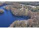 Aerial view of waterfront property with access to lake at 8537 Cameo Dr, New Port Richey, FL 34654