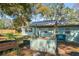 Backyard with garden and unique water feature at 8537 Cameo Dr, New Port Richey, FL 34654