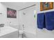 Clean bathroom featuring a bathtub, shower, and modern vanity at 8537 Cameo Dr, New Port Richey, FL 34654