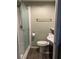 Clean bathroom with a shower/tub combo, toilet, and vanity with sink at 8537 Cameo Dr, New Port Richey, FL 34654