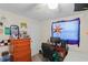 Bedroom with a twin-sized bed, dresser, and desk at 8537 Cameo Dr, New Port Richey, FL 34654