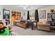 Bedroom with a double bed, desk, chair, and closet at 8537 Cameo Dr, New Port Richey, FL 34654