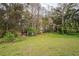 Vacant land with a gate leading to a waterfront view at 8537 Cameo Dr, New Port Richey, FL 34654