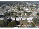 Aerial view showing neighborhood homes and surrounding landscape at 10904 90Th Ter, Seminole, FL 33772
