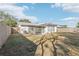 Large backyard with grassy area and screened porch at 10904 90Th Ter, Seminole, FL 33772