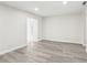 Bright living room with vinyl plank flooring and an open concept at 10904 90Th Ter, Seminole, FL 33772