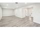 Open concept living room and kitchen with gray flooring at 10904 90Th Ter, Seminole, FL 33772