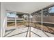 Spacious screened porch overlooking backyard, perfect for relaxing at 10904 90Th Ter, Seminole, FL 33772