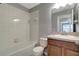 Clean bathroom with a bathtub, toilet and vanity at 1107 Seminole Sky Dr, Ruskin, FL 33570